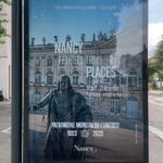 Affiche voie publique de la Métropole de Nancy pour annoncer les 40 ans du classement des trois places au patrimoine mondial de l'UNESCO