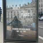 Affiche voie publique de la Métropole de Nancy pour annoncer les 40 ans du classement des trois places au patrimoine mondial de l'UNESCO